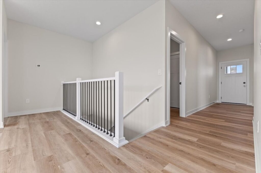 This is an image of our new available home's address - 575 NW Prairie Rose Ln in Waukee, IA Hall view