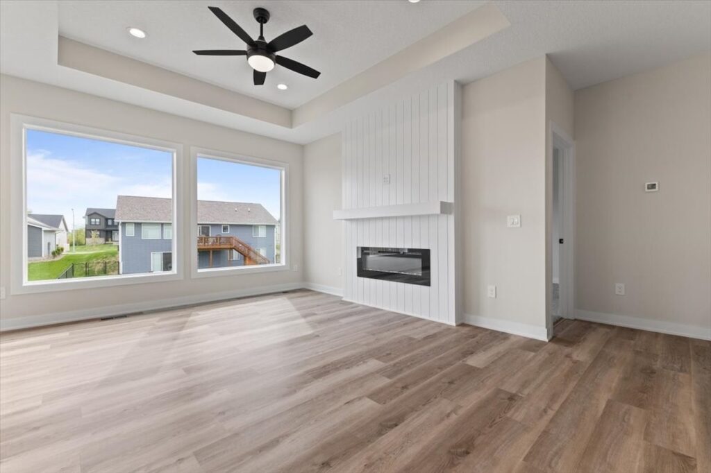 This is an image of our new available home's address - 575 NW Prairie Rose Ln in Waukee, IA Living room