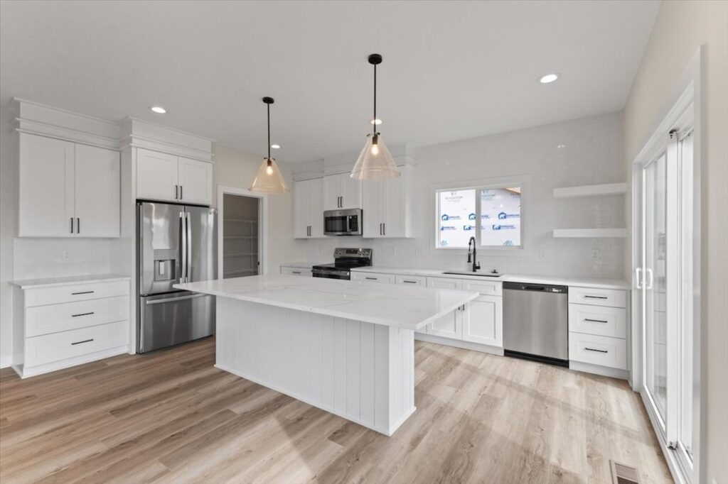 This is an image of our new available home's address - 575 NW Prairie Rose Ln in Waukee, IA kitchen (1)