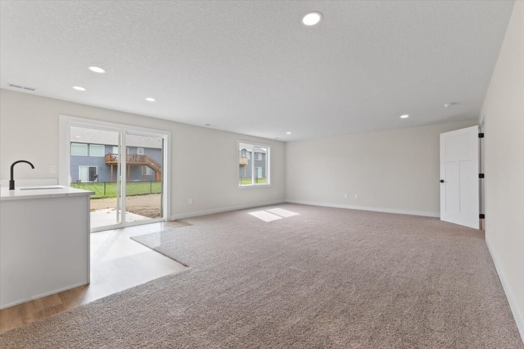 This is an image of our new available home's address - 575 NW Prairie Rose Ln in Waukee, IA living room (1)