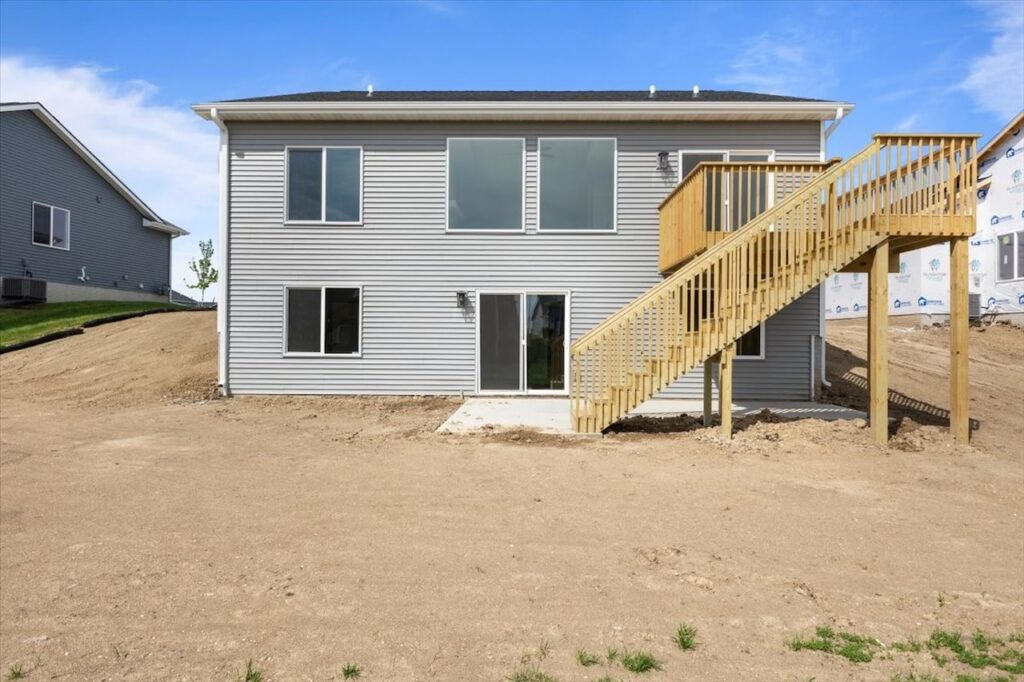 This is an image of our new available home's address - 575 NW Prairie Rose Ln in Waukee, IA views from the back of the house