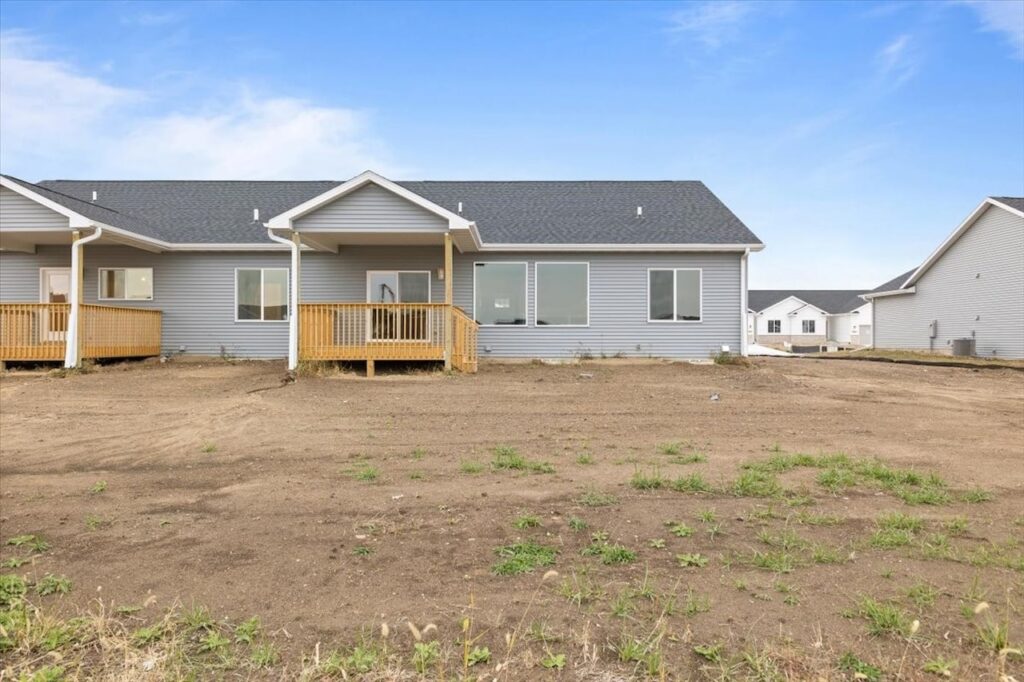 Exterior of a house featuring a porch and yard, for sale at 4517 NW 17th St, Ankeny, IA, from New Gladiator.